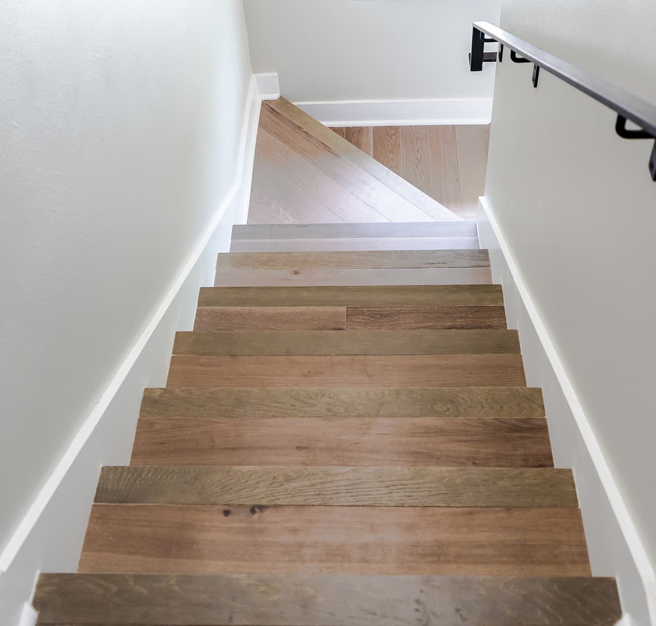 A wooden staircase in soft daylight